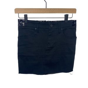 RtA black denim mini skirt -back is patent. Exposed zipper. Raw hem size 0